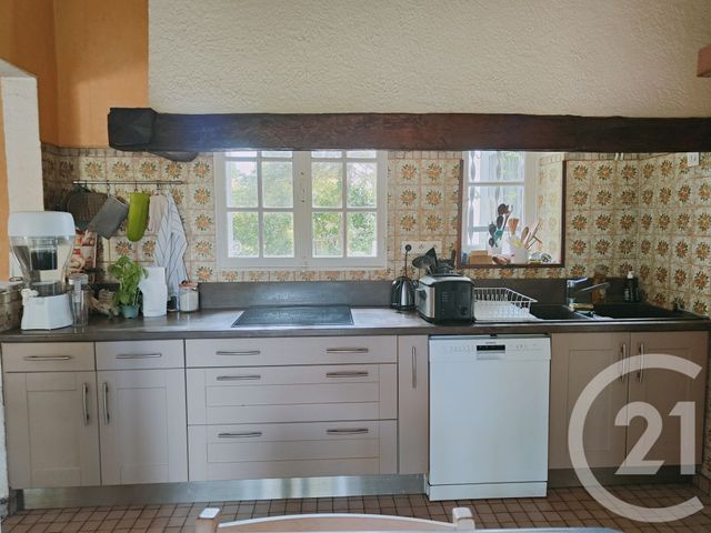 maison à vendre - 7 pièces - 214.5 m2 - LA CHAPELLE MONTLINARD - 18 - CENTRE - Century 21 Agence Ducreux