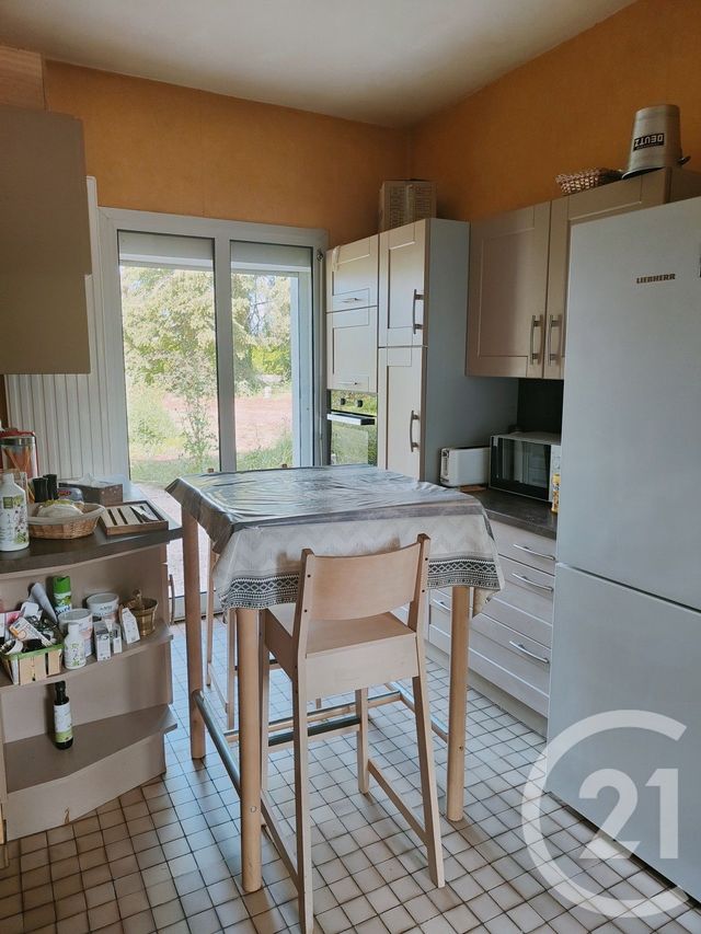 maison à vendre - 7 pièces - 214.5 m2 - LA CHAPELLE MONTLINARD - 18 - CENTRE - Century 21 Agence Ducreux